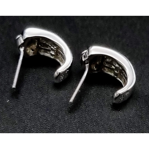 772 - 14K White Gold Diamond Stud Earrings 
0.40ct Diamonds
weighs 2.8g