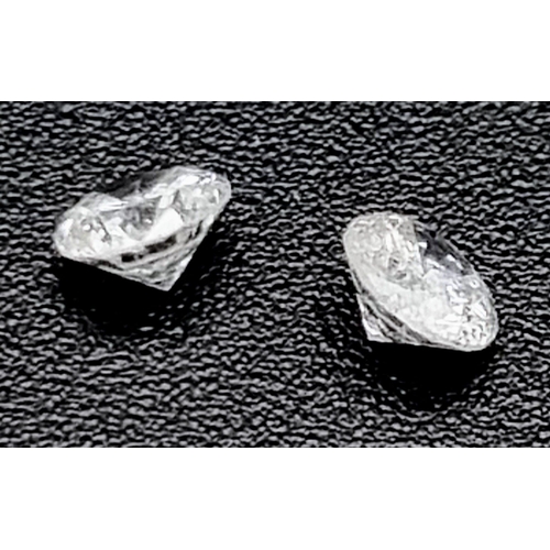 860 - PAIR OF ROUND BRILIANT CUT DIAMONDS, 0.35CT TOTAL