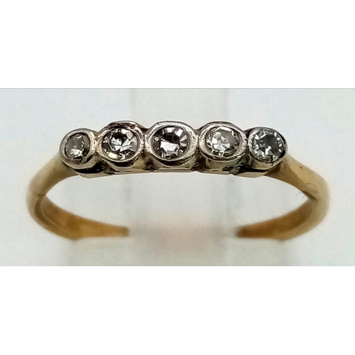 886 - An 18K yellow gold and platinum, vintage ring with a row of five diamonds. Ring size: M, weight: 1.8... 