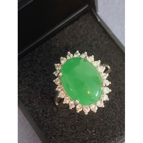 1057 - Stunning SILVER and TOURMALINE RING, having large green TOURMALINE CABOCHON set to top with pale AQU... 