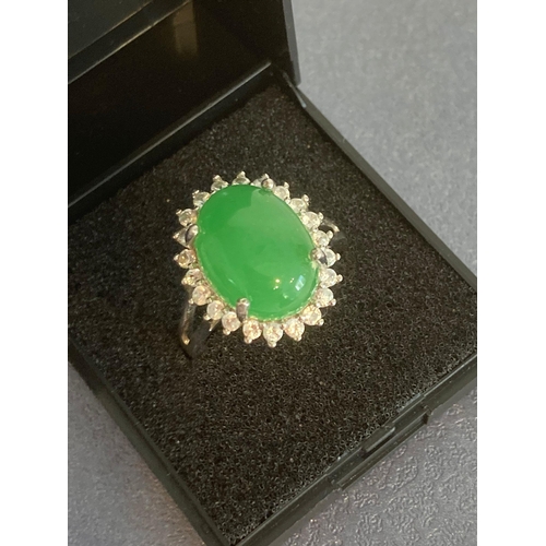 1057 - Stunning SILVER and TOURMALINE RING, having large green TOURMALINE CABOCHON set to top with pale AQU... 