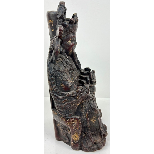 277 - A CHINESE BRONZE STATUE OF YUANBAO SEATED IN DRAGON CHAIR , A BUDDHA THAT DEPICTS WEALTH AND MONEY. ... 