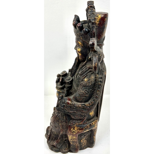 277 - A CHINESE BRONZE STATUE OF YUANBAO SEATED IN DRAGON CHAIR , A BUDDHA THAT DEPICTS WEALTH AND MONEY. ... 