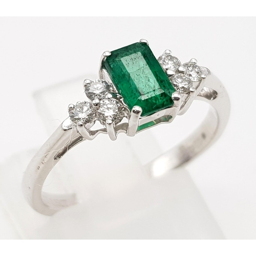 621 - 9k White Gold and Emerald ring.
0.15ct Diamonds, 0.50ct Emerald
Weighs 1.9g
Size K