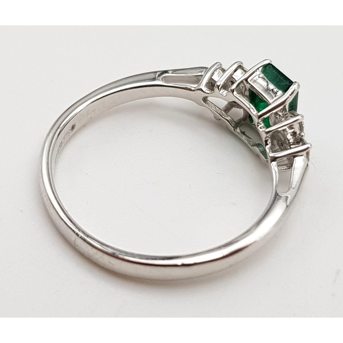 621 - 9k White Gold and Emerald ring.
0.15ct Diamonds, 0.50ct Emerald
Weighs 1.9g
Size K