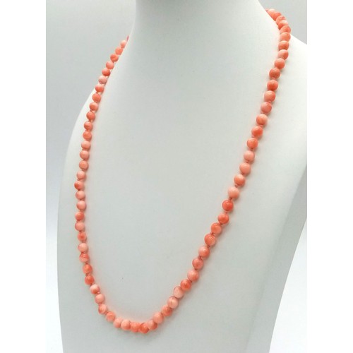 1097 - A Cultured Pink and White Seed Pearl Necklace and Earring Set. 48cm.