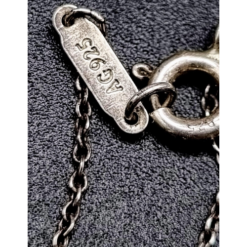 1106 - TIFFANY & CO STERLING SILVER KEY PENDANT ON SILVER CHAIN 2G