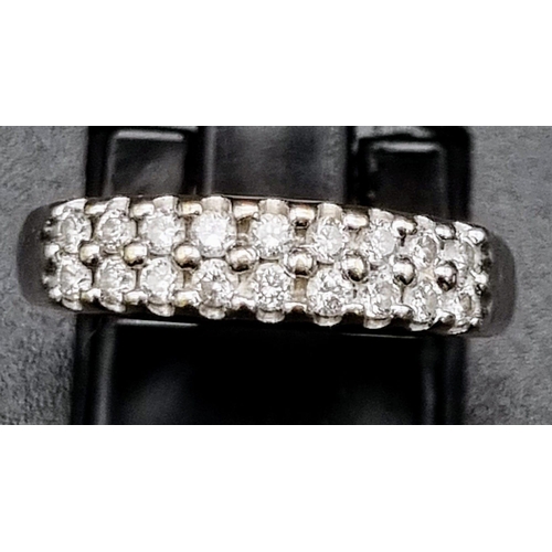 454 - 18K White Gold 2 Row Diamond Ring
0.25ct Diamond
Weighs 3.3g
Size k 1/2