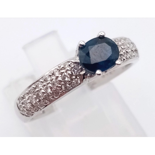 514 - 18K White Gold Diamond and Sapphire Ring
0.25ct Diamond 0.82ct Sapphire
Weighs 3.63g
Size N