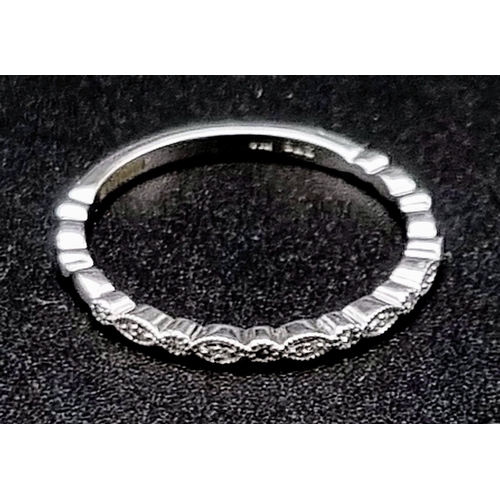 890 - 9K White Gold Diamond Band Ring
Weighs 1.52g
Size P