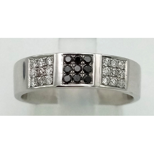 607 - 9k White Gold Black and White Diamond Set Band ring.
0.25ct Diamond
Weighs 4.1g
Size N