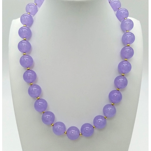 752 - A Gorgeous Large Lavender Bead Alexandrite Necklace. Gilded spacers and clasp. 14mm beads. 42cm