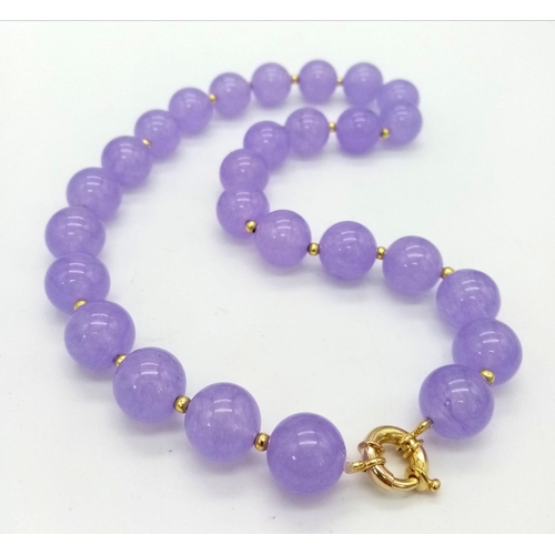 752 - A Gorgeous Large Lavender Bead Alexandrite Necklace. Gilded spacers and clasp. 14mm beads. 42cm