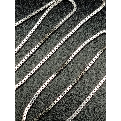 416 - 18K 2 TONE PENDANT ON 18K White Gold Chain.
Weighs 4.06g
Chain 42cm length pendant 2cm