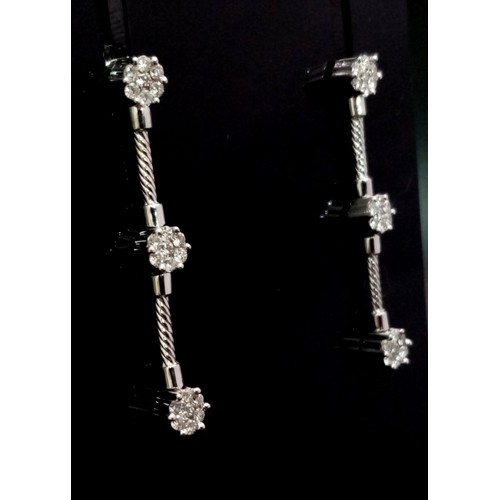 570 - 18k White Gold Diamond set drop Earrings 
0.50ct Diamonds
Weighs 3.6g