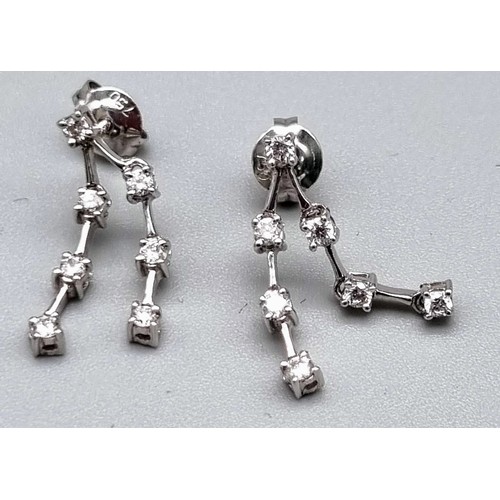 779 - 18k White Gold set drop earrings 0.20ct Diamonds, Weighs 2g