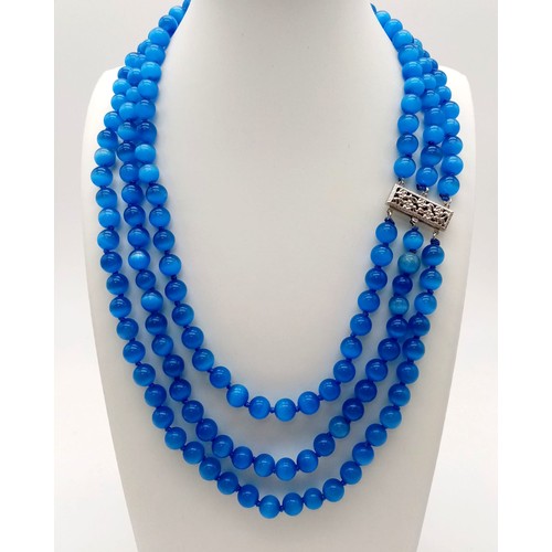 682 - A Mesmerising Three-Row Mexican Blue Opal Cat's Eye Beaded Necklace. 44-48cm. 8mm beads.