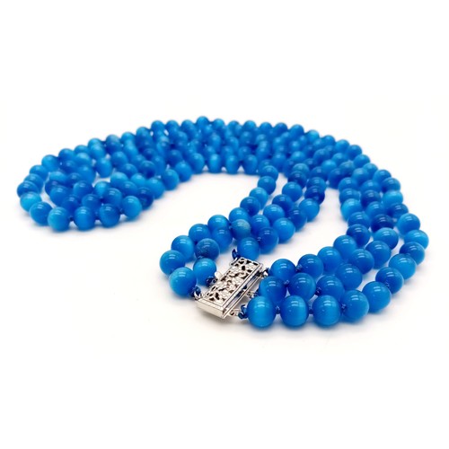 682 - A Mesmerising Three-Row Mexican Blue Opal Cat's Eye Beaded Necklace. 44-48cm. 8mm beads.