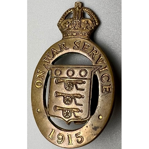 826 - A WW1 British Brass 1915 Dated “On War Service” Lapel Badge.