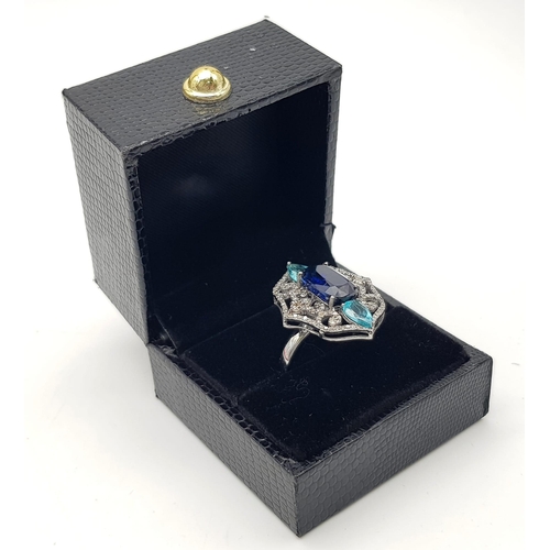 442 - An Antique-Styled Blue Sapphire, Emerald and Diamond Ring set in 925 Silver. Diamond weight - .68cts... 