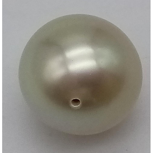 562 - A Natural Golden South Sea Pearl. 15mm. 4.1g.