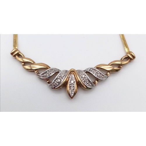 482 - A 9K Yellow Gold and Diamond Pierced Necklace, 40cm. 4.32g