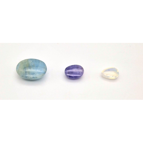 593 - Lot of 2 Gemstones - 10.85ct  Mixed Concave Cut Lemon Quartz and a 4.95ct Mixed Concave Cut Green Am... 