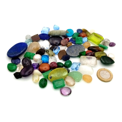 298 - A 1200ct of Mixed Coloured Stones Lot. Some are semi precious and some synthetic. A/F