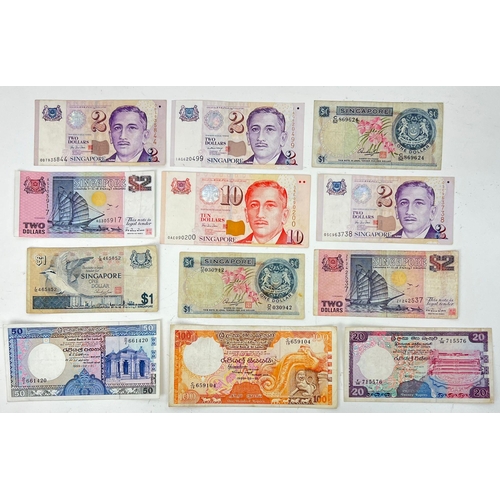 1100 - Twelve Vintage Singapore and Sri Lankan Currency Notes. please see photos for conditions.