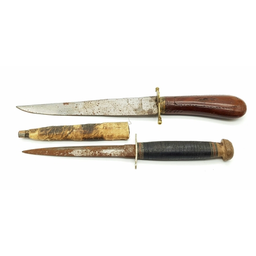 1103 - Two Vintage Daggers: An Indian dagger with hand carved handle and a Sheffield made small dagger with... 