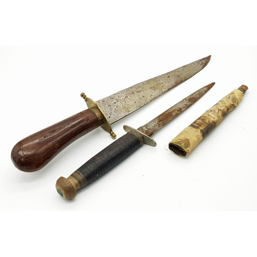 1103 - Two Vintage Daggers: An Indian dagger with hand carved handle and a Sheffield made small dagger with... 