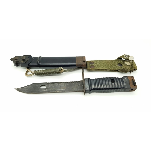 136 - A KCB-70  NWM Bayonet/Knife for the Stoner Rifle. Comes with sheaf and frog. Markings on blade. Good... 