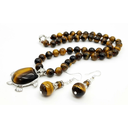 429 - A Tigers Eye Necklace with Tortoise Pendant - Plus a par of tigers eye drop earrings. Necklace - 44 ... 