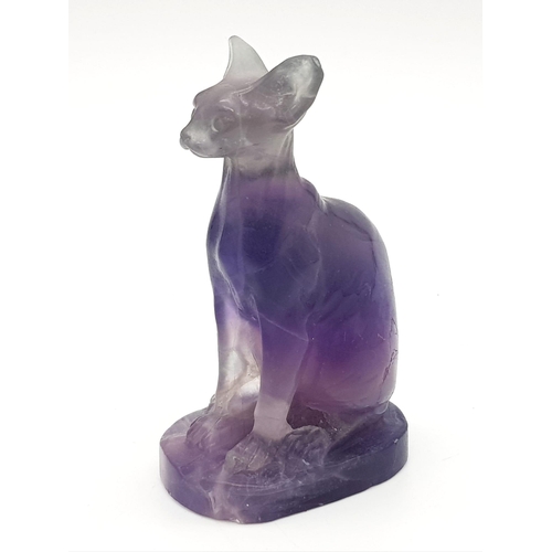 438 - A Rainbow Fluorite Cat Figurine. 8.5cm tall.