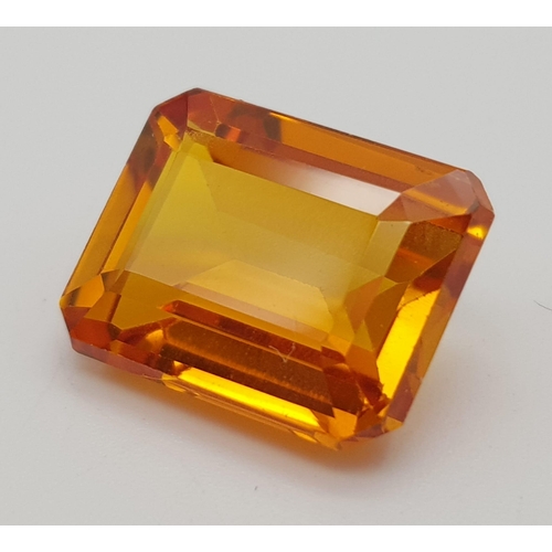 597 - A Beautiful 16ct Orange and 8ct Purple Gemstone. Rectangular step-cut. 15 x 12mm and 12 x 10mm.