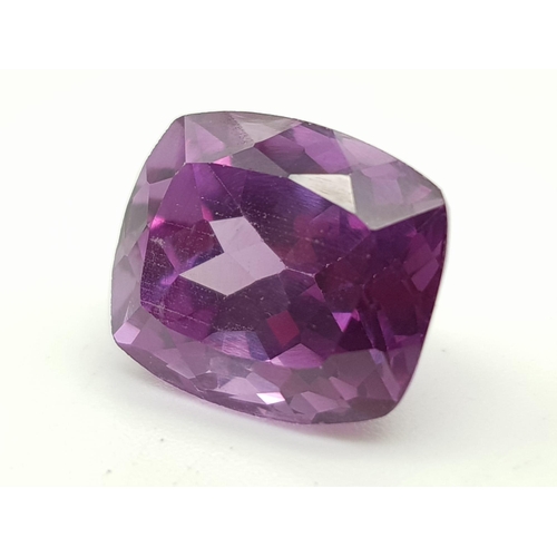 597 - A Beautiful 16ct Orange and 8ct Purple Gemstone. Rectangular step-cut. 15 x 12mm and 12 x 10mm.