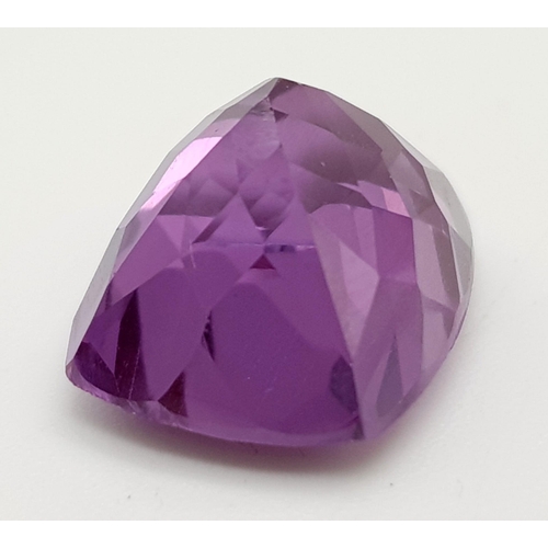 597 - A Beautiful 16ct Orange and 8ct Purple Gemstone. Rectangular step-cut. 15 x 12mm and 12 x 10mm.