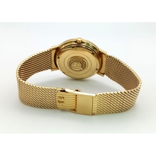 43 - A 1960s 18K Solid Gold Omega Constellation Gents Watch. 18K gold strap and case - 36mm. White dial w... 