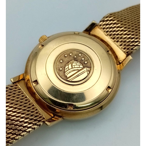 43 - A 1960s 18K Solid Gold Omega Constellation Gents Watch. 18K gold strap and case - 36mm. White dial w... 