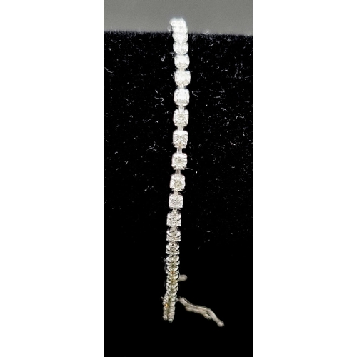 26 - 18k White Gold Tennis Bracelet. Weighs 6.5g, 2.3ct Diamond.