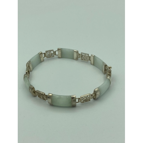 70 - SILVER and WHITE JADE BRACELET Having Silver Chinese symbols for Health, luck, prosperity etc. 19 cm... 