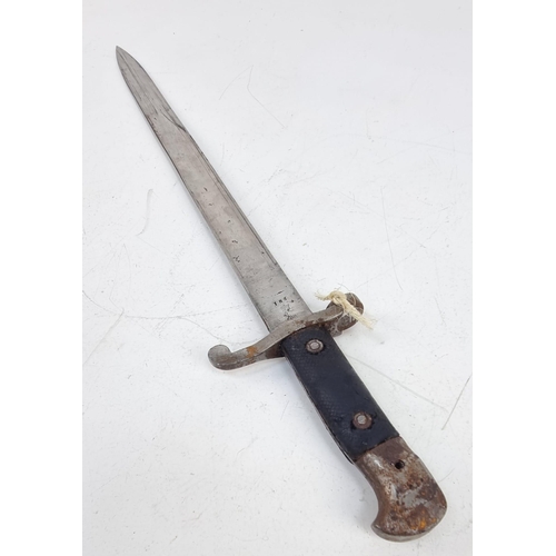 290 - A British 1888 MKII Sword Bayonet with Scabbard. Markings on blade. In fair/good condition but pleas... 