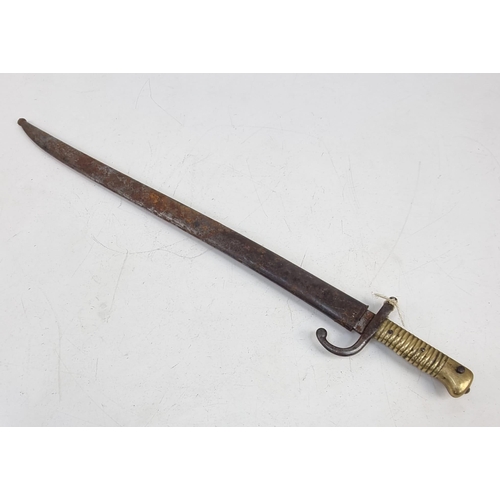 293 - An Antique 1868 French Brass-Handled Bayonet. Markings on base of blade - year and makers mark on si... 