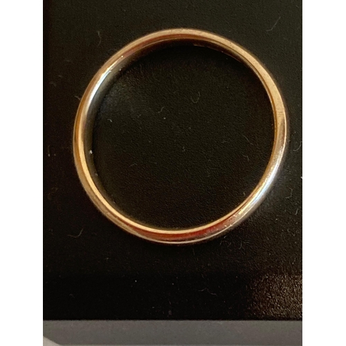 307 - 9k GOLD RING in plain band form. Having full UK hallmark and complete with ring box. 2.87 grams. Siz... 