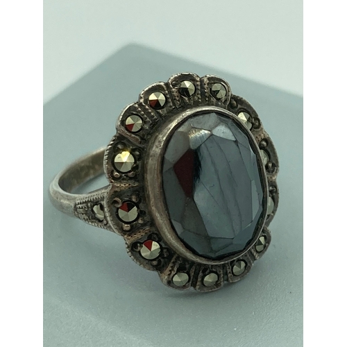 371 - Vintage SILVER and MAGIC TOPAZ RING, having 2 carat oval TOPAZ set to top with SILVER MARCASITE surr... 