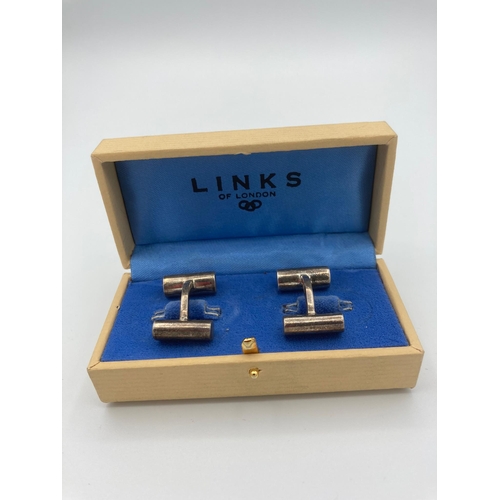 448 - Pair of SOLID SILVER LINKS of LONDON CUFFLINKS. Full UK hallmark. Presented in the original box.