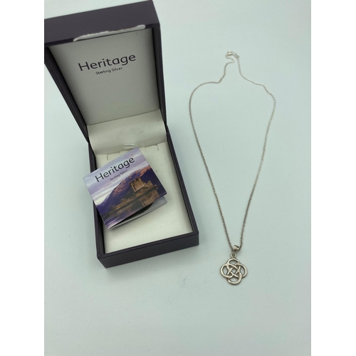 483 - SILVER CELTIC KNOT PENDANT and CHAIN from the Heritage collection. Designed by Kit Heath and complet... 