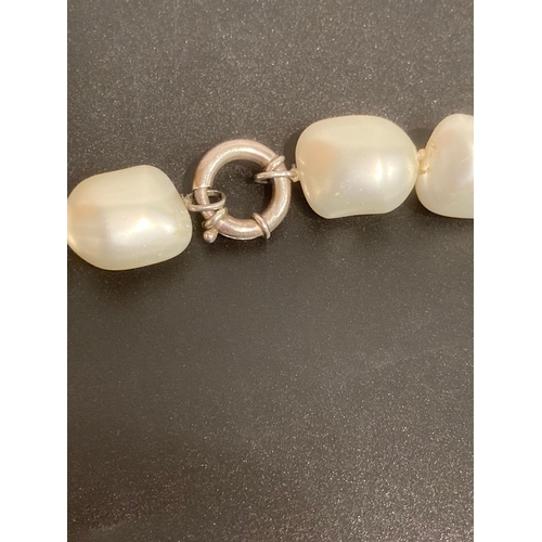 490 - SILVER and PEARL NECKLACE having a  row of individually knotted large faux pearls with a chunky 925 ... 