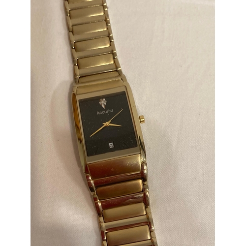 499 - ACCURIST WRISTWATCH MB 594B. Black face model with diamond point at 12. Golden digits and hands,  sw... 