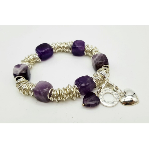 556 - A Jade and an Amethyst Square-Cut Gemstone Expandable Bracelet. Each with twin-heart decoration.